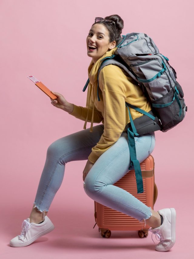 cropped smiley woman posing her baggage scaled 1